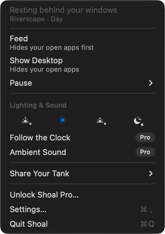 Shoal's fish menu: a status line, Feed and Show Desktop each saying it hides your open apps, Pause, the Lighting & Sound section with the lighting presets, Follow the Clock and Ambient Sound marked Pro, Share Your Tank, Unlock Shoal Pro, Settings and Quit Shoal